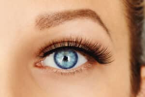Woman with lifted brow after a brow lift in Main Line Philadelphia, PA